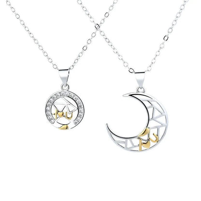 Sun and Moon copper couple's necklaces on a dark background, showing the detailed 4.5cm pendants and cross chain.