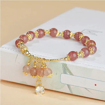 Pink heart-shaped strawberry quartz crystal bracelet with pearl accents for women