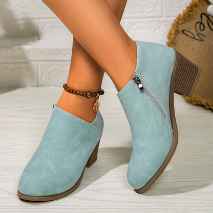 Women's chunky heel ankle boots with side zipper in blue, black, and khaki