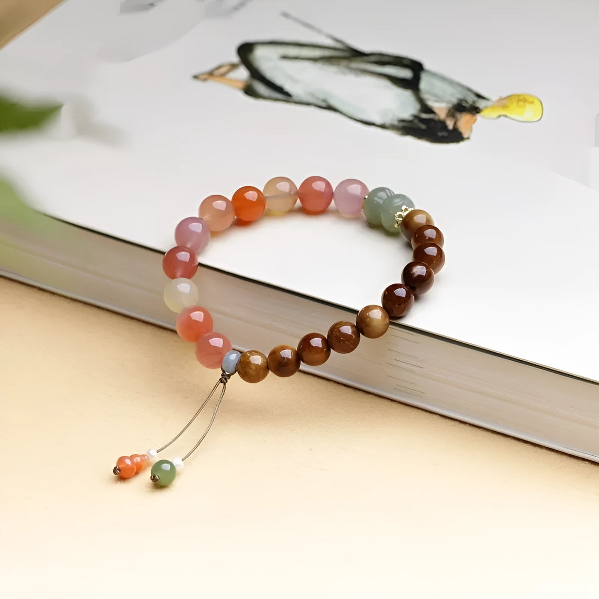 8mm diamond-shaped persimmon agate bracelet beads on wrist