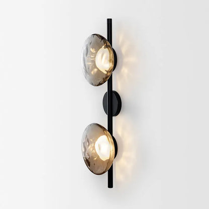 Wall-mounted bedside lamp with glass shade and iron body in various finish options