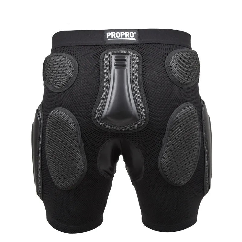 Black cycling hip protection pants shown laid flat, designed for impact safety during sports.