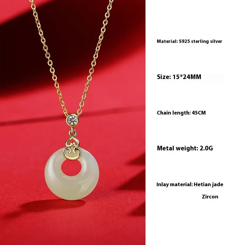 Chinese style sterling silver and Hetian jade jewellery set with bracelet, necklace, and earrings.
