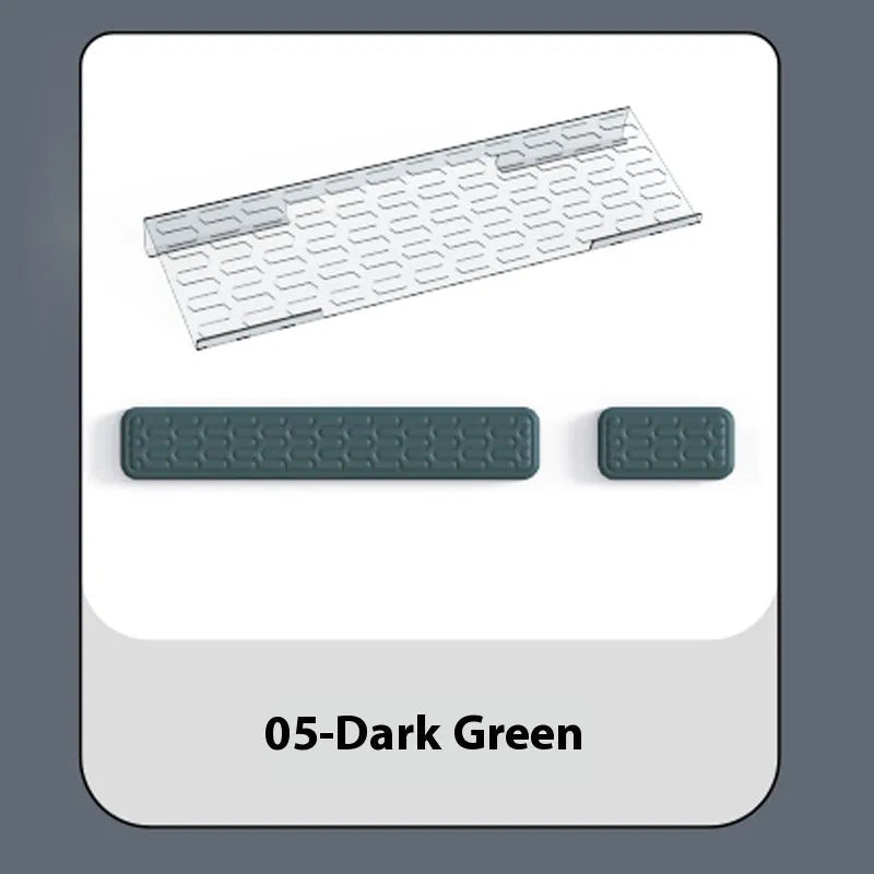 Double-sided black and grey keyboard mouse pad with wrist strap and hand pillow on a desk.