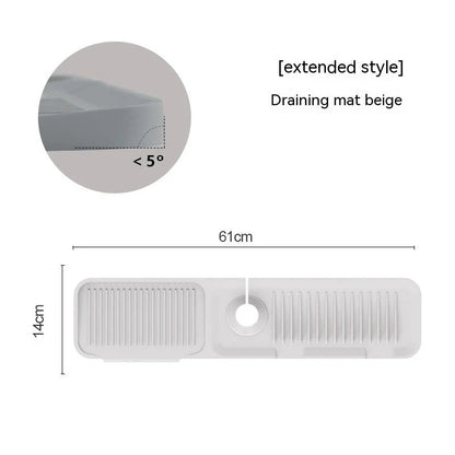 Silicone faucet splash guard with sloped design and dual drains for efficient water drainage in kitchen and bathroom sinks