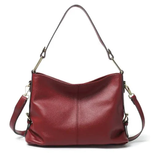 Black genuine leather vertical crossbody bag with multiple internal compartments and a sandwich pocket.