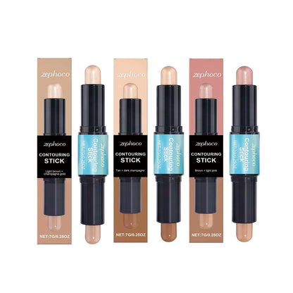 Dual-ended cream contour and highlighter makeup stick showing two shades, Tan Dark Champagne and Light Pink.