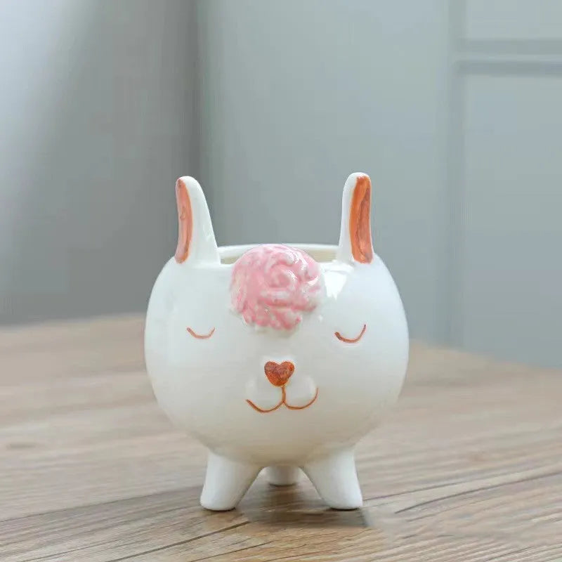 Ceramic succulent flowerpot with hand-painted cartoon animal and floral design in rustic style