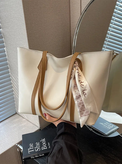 Women's large capacity casual tote crossbody shoulder bag in khaki colour with outer pocket and zip compartment.