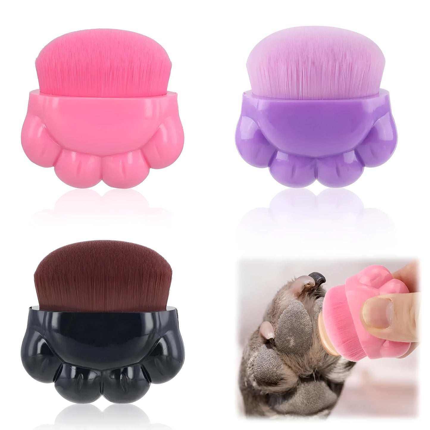 Three small paw-shaped pet balm brushes with soft heads inside clear plastic storage cases.