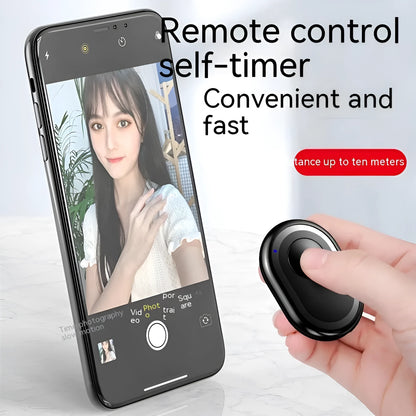 Black wireless Bluetooth remote control for cameras with tripod mount thread