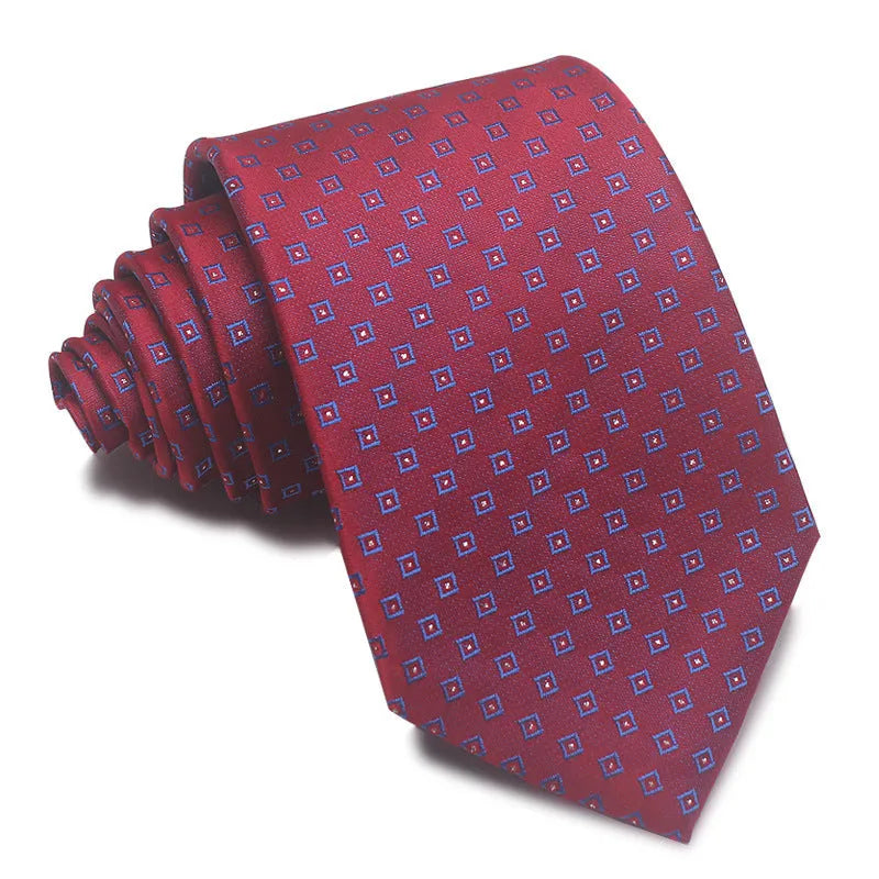 Close-up of a red and black striped men's business tie with a textured Jacquard weave, showing the 8cm width and arrow point shape.