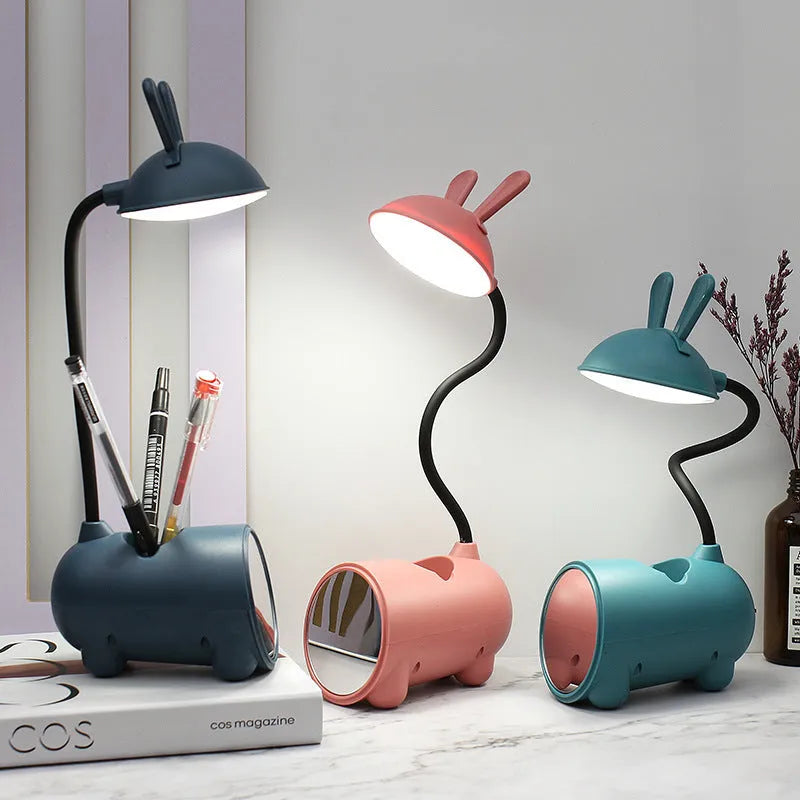 Green desktop table lamp with pen container, measuring 30 cm wide with USB power cable