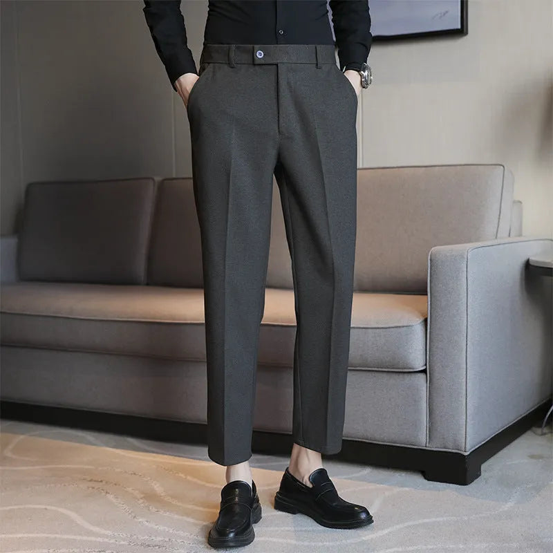 Straight-leg brown corduroy trousers with elastic waistband on size chart