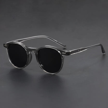 Ultra-light round frame retro sunglasses with polarised grey lenses in multiple colour options