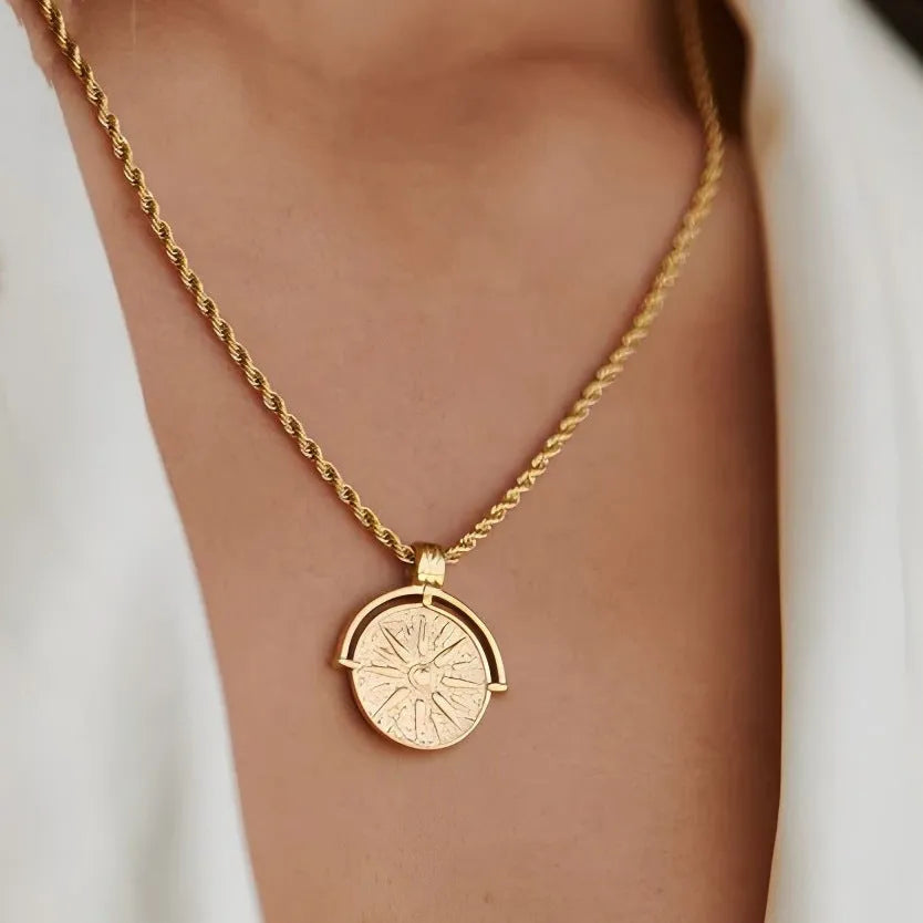Stainless steel sunflower pendant necklace with geometric embossed design on adjustable chain