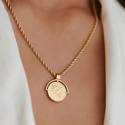 Stainless steel sunflower pendant necklace with geometric embossed design on adjustable chain