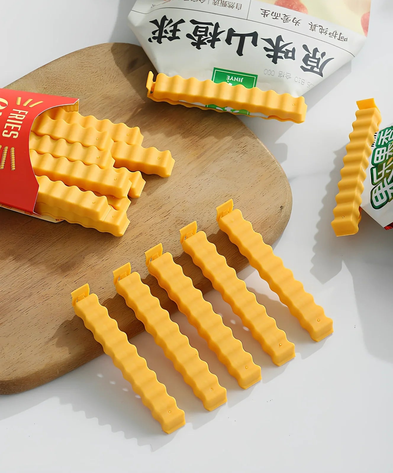 12-pack of white plastic food sealing clips, some with refrigerator stickers, for kitchen bag storage