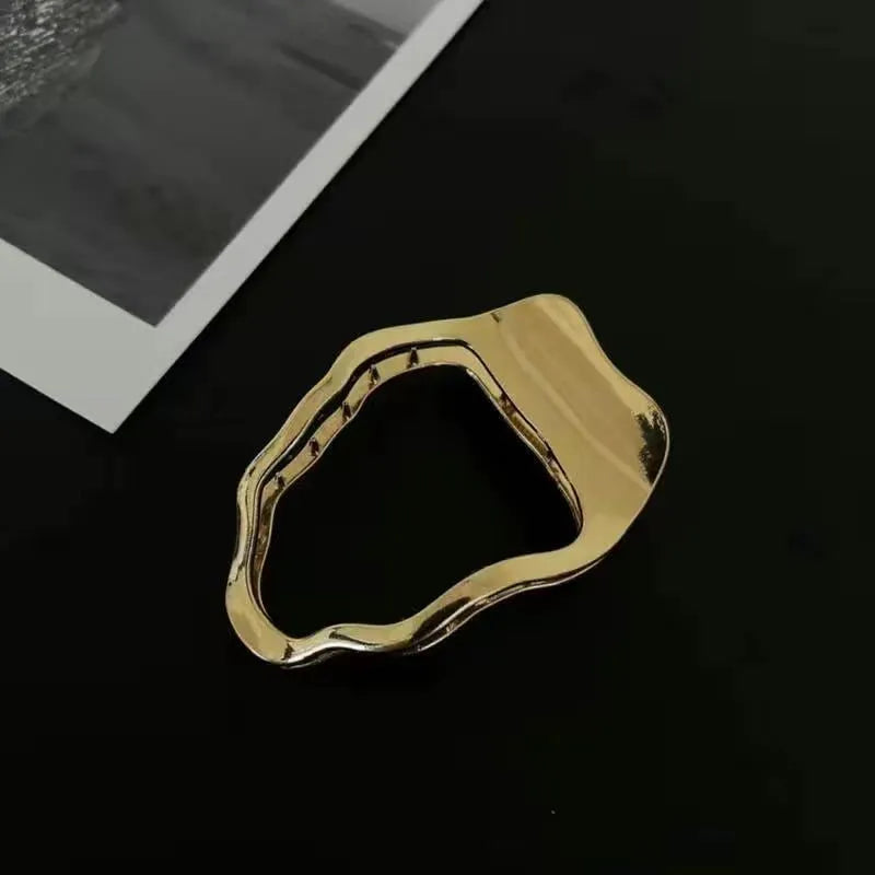 Women's zinc alloy hair barrettes in gold and silver with square, arc, and triangle shapes