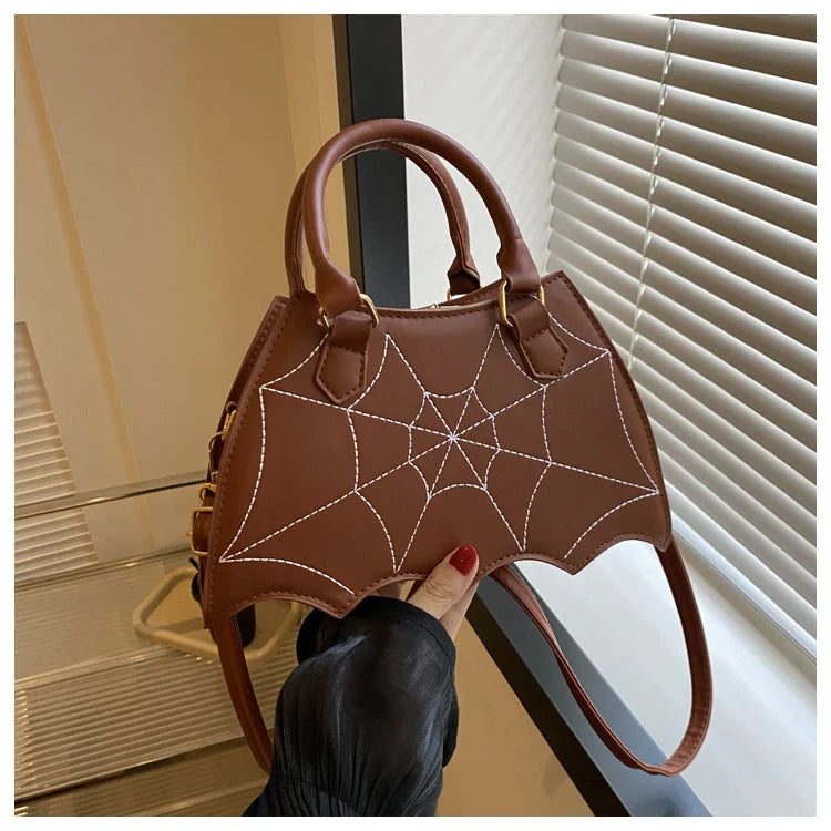 Stylish spider web design shoulder bag in various colours for Halloween fashion