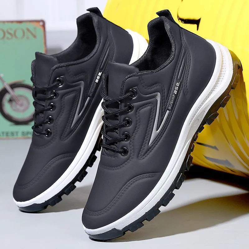 Student waterproof leisure sports shoes with soft PU upper and plastic sole in black/red or black/grey colourways, featuring low-top flat-heel design and pointed toe suitable for casual outdoor activities.