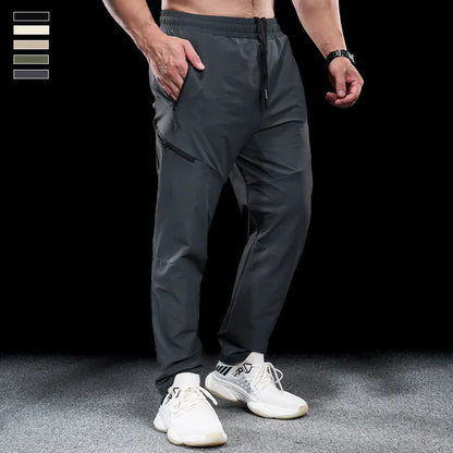 Men's waterproof quick-drying nylon workout trousers in multiple colour options