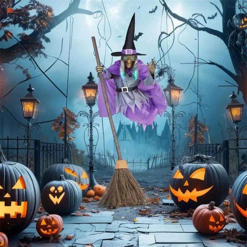 Floating witch Halloween decoration with broom, lifelike scary face, and purple hovering skirt