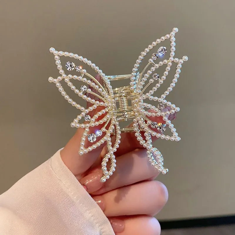 Butterfly hair clip for women with alloy construction and rhinestone or pearl decoration