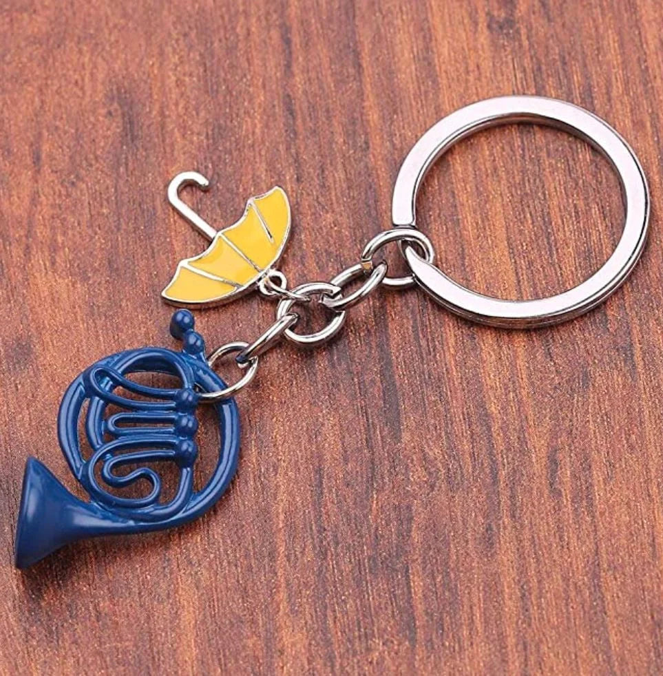 Blue French Horn and Yellow Umbrella Keychain made from durable metal alloy