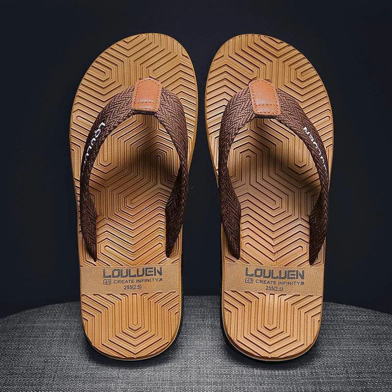Men's black flip flops with a PVC sole and EVA upper on a plain background.