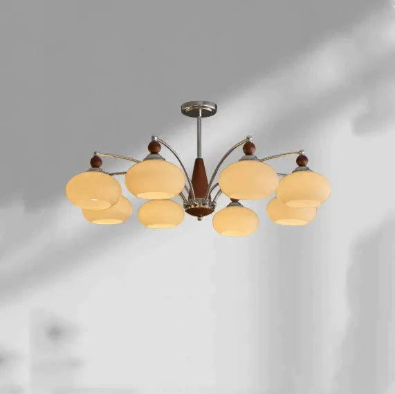 Persimmon glass chandelier with chrome frame in Middle Ancient style, shown with multiple glass shades.