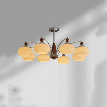 Persimmon glass chandelier with chrome frame in Middle Ancient style, shown with multiple glass shades.