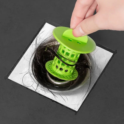 Anti-clogging plastic sink filter in blue, green, orange, and white