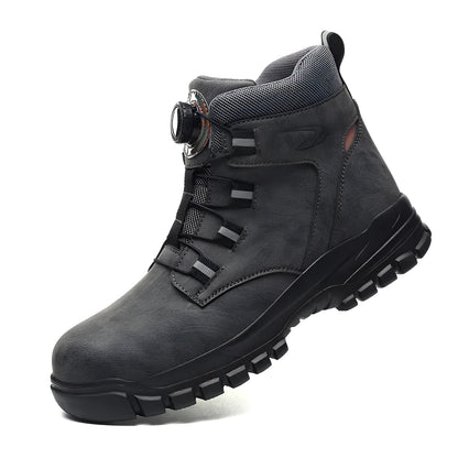 A pair of black leather labour protection safety shoes with rubber soles on a plain background.