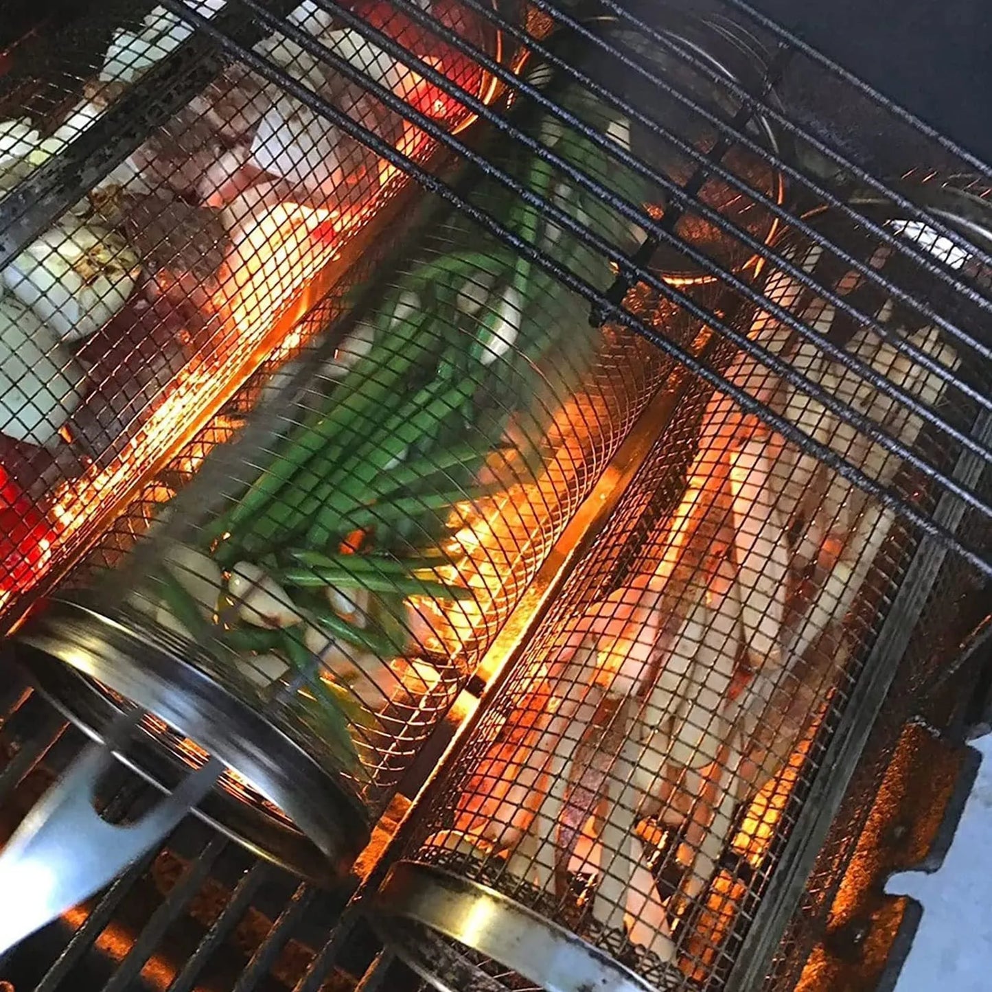 Silver iron wire rolling cylinder BBQ basket with mesh design and a hook for grilling.