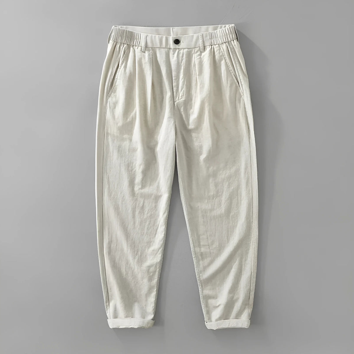 Men's loose-fit straight-leg trousers in a cotton linen blend, shown in a raw jute colour.