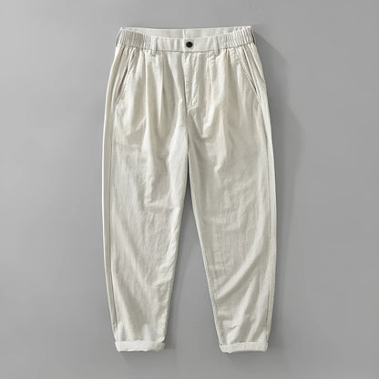 Men's loose-fit straight-leg trousers in a cotton linen blend, shown in a raw jute colour.