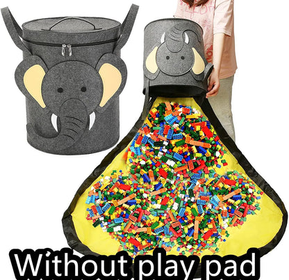 Green felt storage cube with pull rope, unfolded flat as a square play mat next to toys.