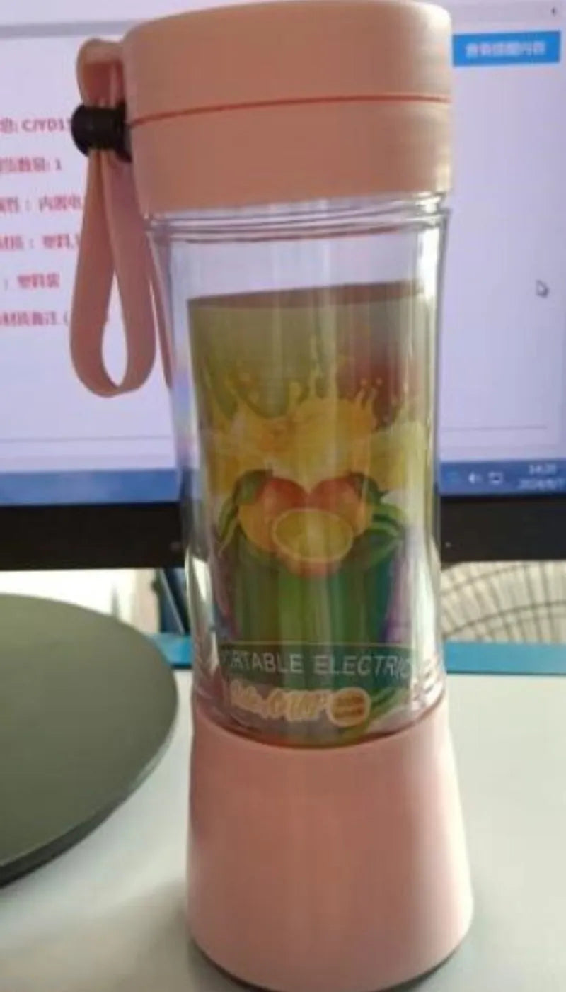 Portable USB blender with six blades in pink colour option showing cup and charging cable