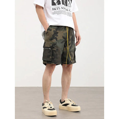 Men's camouflage coloured cargo shorts with multiple pockets and cropped leg length