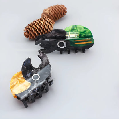Handmade cellulose acetate beetle grip with caterpillar element in cartoon style decorative clip