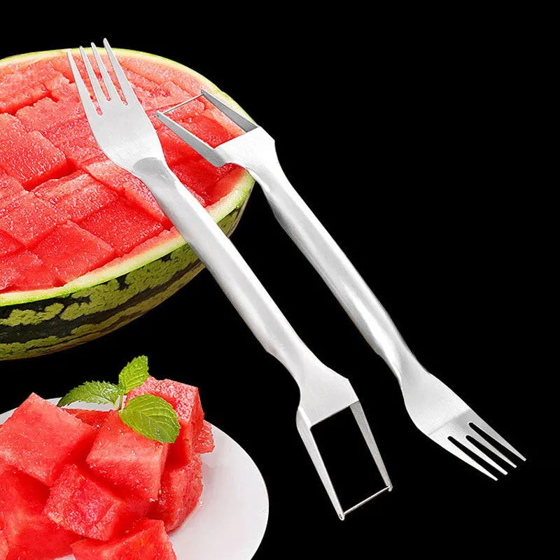 Stainless steel watermelon slicer and serving fork on a kitchen counter.