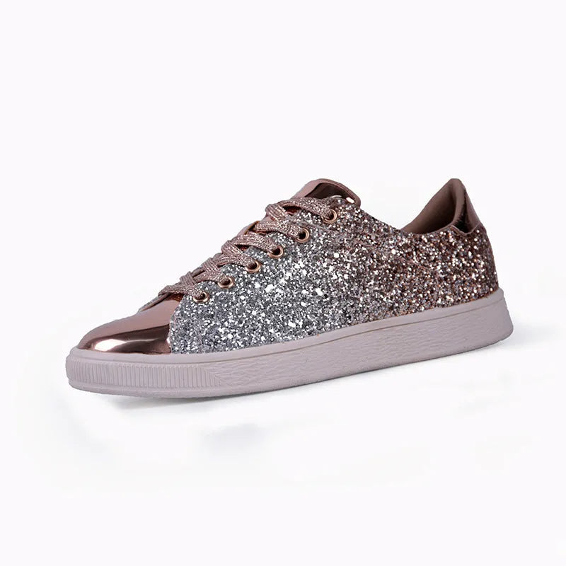 Women's low-top casual shoes with black sequin upper, round toe, and white rubber sole with lace-up closure.
