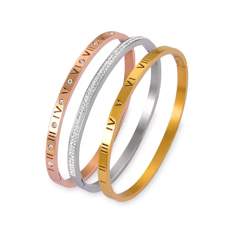 Titanium steel Roman numeral bracelet with gold plated carved design and diamond-embedded detail