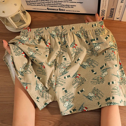 Men's loose fit cotton printed boxer shorts in a grey and blue pattern on a mid waist design.