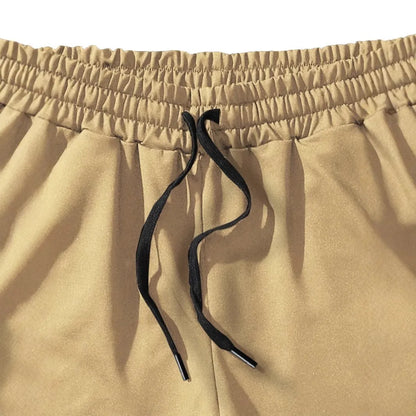 Men's khaki coconut print sports shorts with straight leg and elasticated waistband