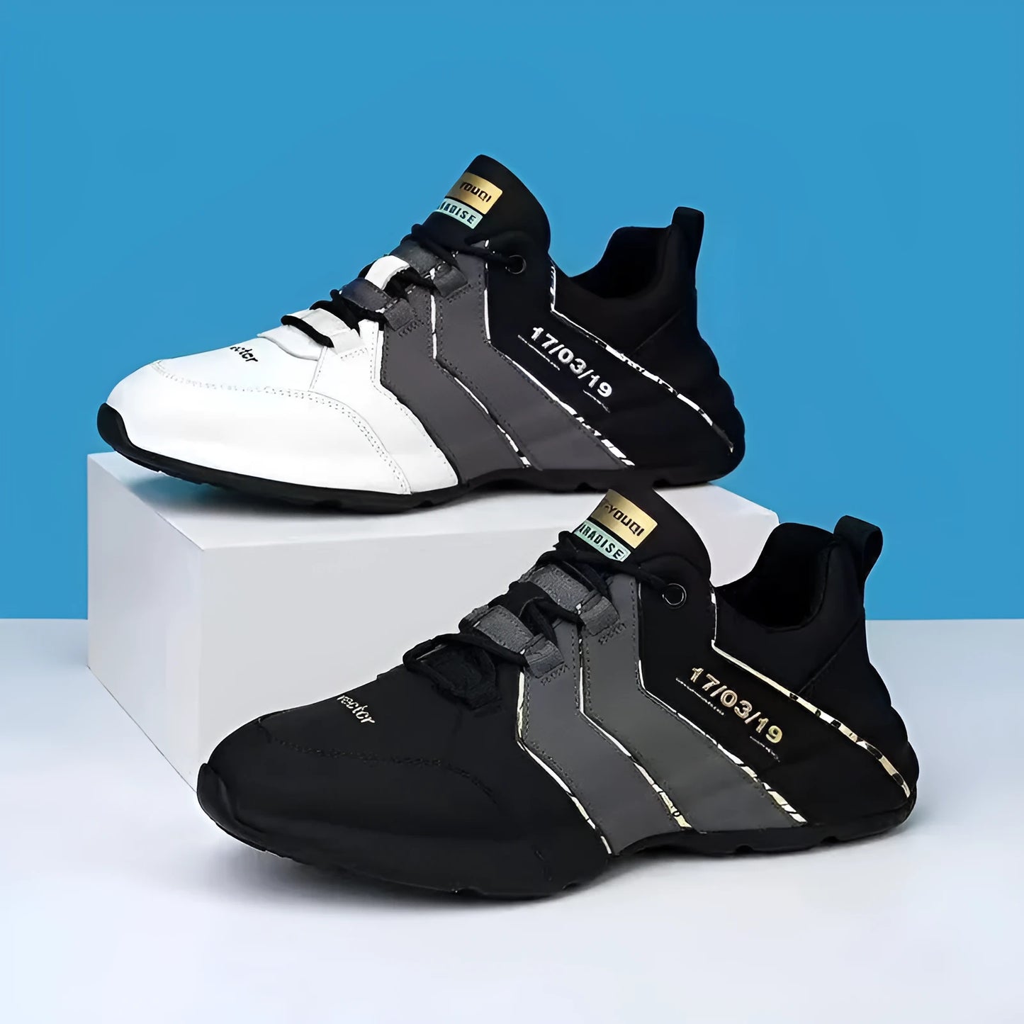 Pair of casual low-top lace-up sneakers with round toe and mesh lining on a plain background.