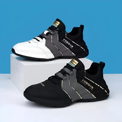 Pair of casual low-top lace-up sneakers with round toe and mesh lining on a plain background.