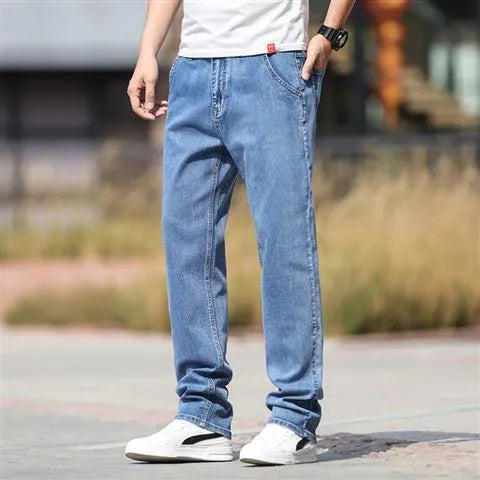 Men's smoky gray straight leg jeans with high elasticity fabric and low waist design