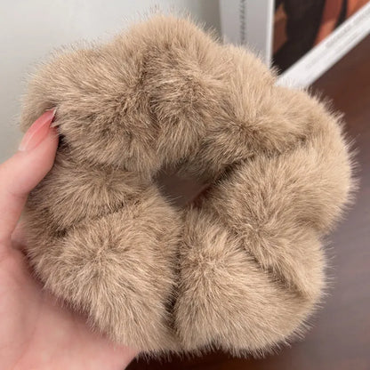 Large intestine coil hair band in mink-like waterproof fabric on a white background.